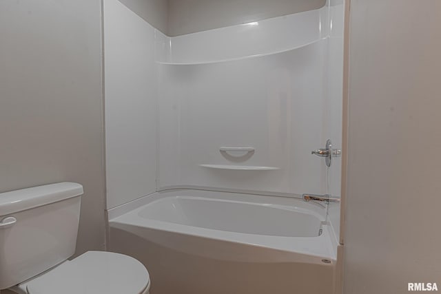 bathroom with toilet and shower / bath combination