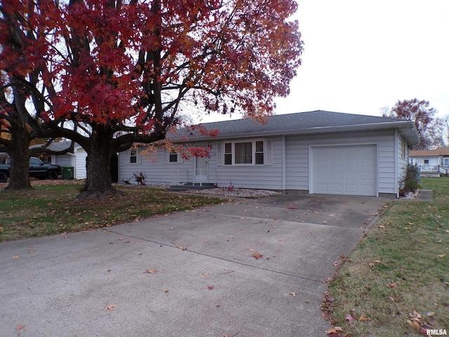 single story home featuring a garage