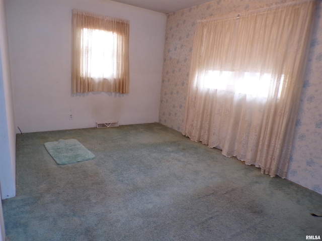 empty room with carpet floors