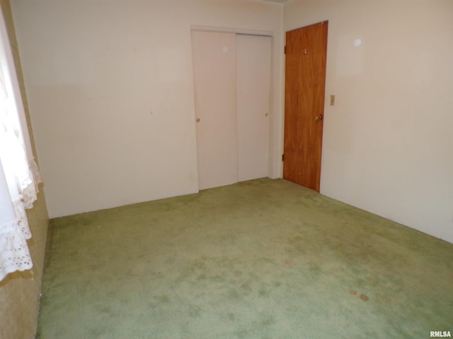 empty room featuring carpet flooring