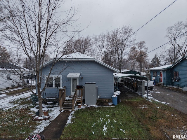 view of snow covered house