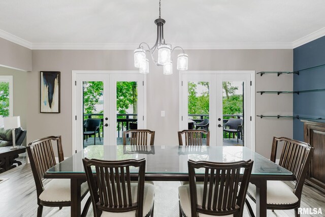 12225 Pebble Point Rd, Marion, IL 62959 - dining room with french doors, light wood-style floors, a chandelier, and ornamental molding