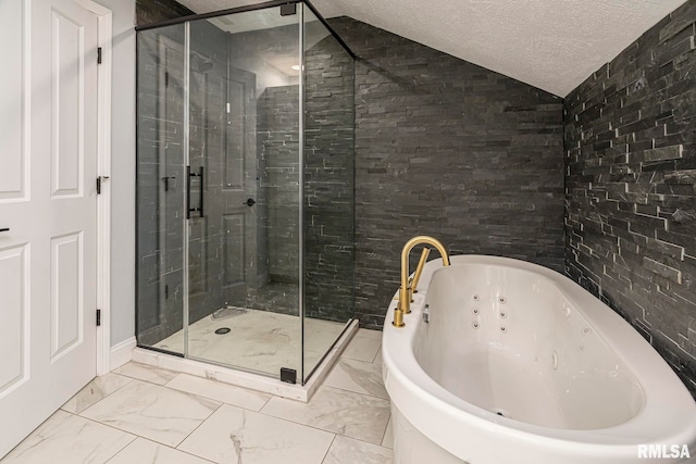 bathroom with separate shower and tub, a textured ceiling, and vaulted ceiling