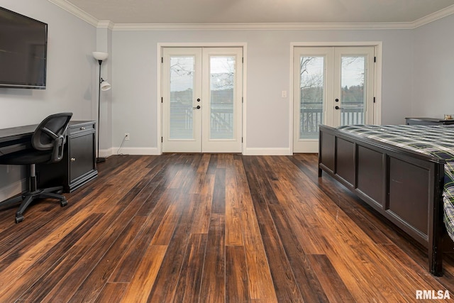 bedroom featuring dark hardwood / wood-style floors, access to exterior, crown molding, and french doors