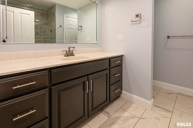 bathroom with vanity and walk in shower