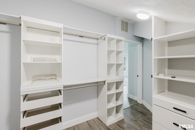 12225 Pebble Point Rd, Marion, IL 62959 - spacious closet featuring wood finished floors