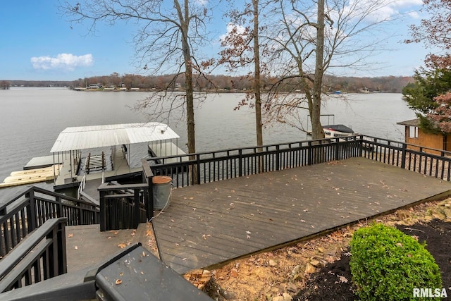 wooden terrace with a water view