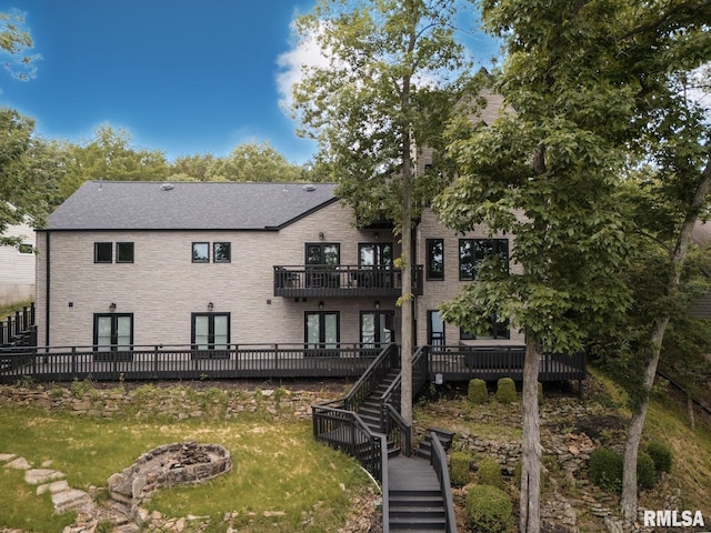 12225 Pebble Point Rd, Marion, IL 62959 - rear view of property with stairway, an outdoor fire pit, a balcony, a wooden deck, and french doors