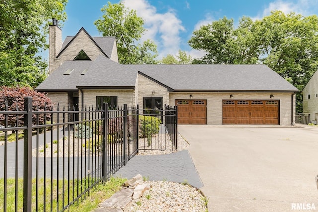 12225 Pebble Point Rd, Marion, IL 62959 - view of front facade featuring a chimney, a shingled roof, concrete driveway, stone siding, and brick siding
