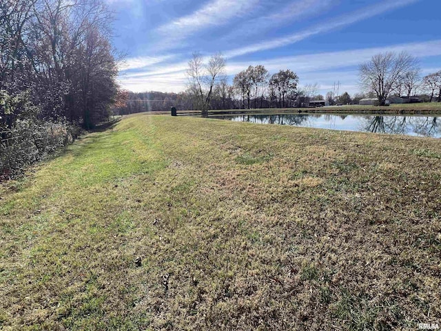 view of yard with a water view