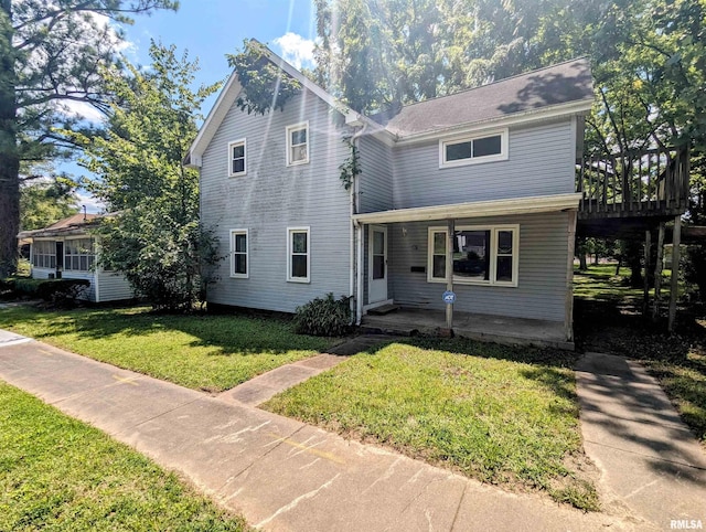 207 E Oak St, Carbondale, IL 62901 - view of front of house with covered porch and a front yard