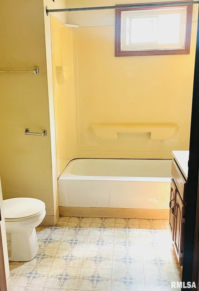 full bathroom featuring vanity, tub / shower combination, and toilet