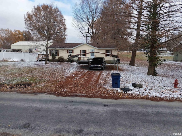 view of front of house featuring a wooden deck