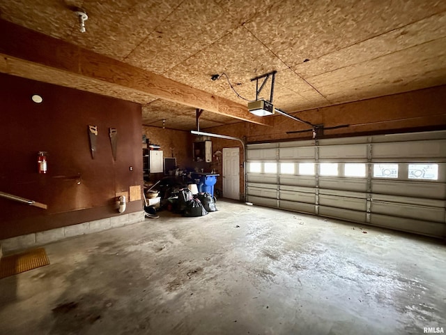 garage featuring a garage door opener