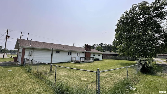 1107 E Cleveland St, West Frankfort, IL 62896 - back of house featuring a wooden deck and a chimney
