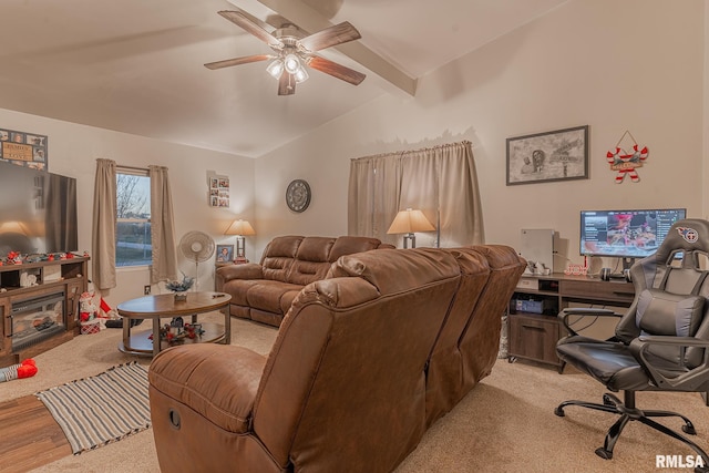 living room with vaulted ceiling with beams, light hardwood / wood-style flooring, and ceiling fan