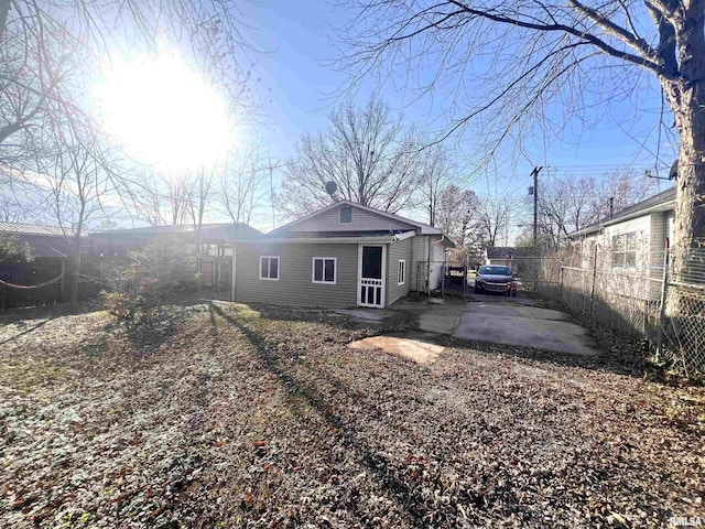 rear view of house featuring a patio