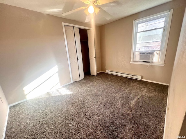 unfurnished bedroom featuring ceiling fan, a closet, carpet, and a baseboard radiator