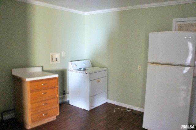 laundry area featuring crown molding, dark wood-type flooring, and washer / dryer