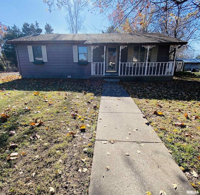 single story home featuring a front yard and a porch