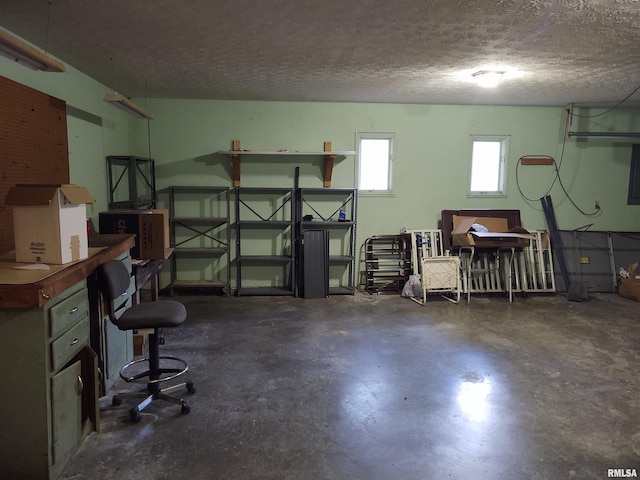 basement with a textured ceiling