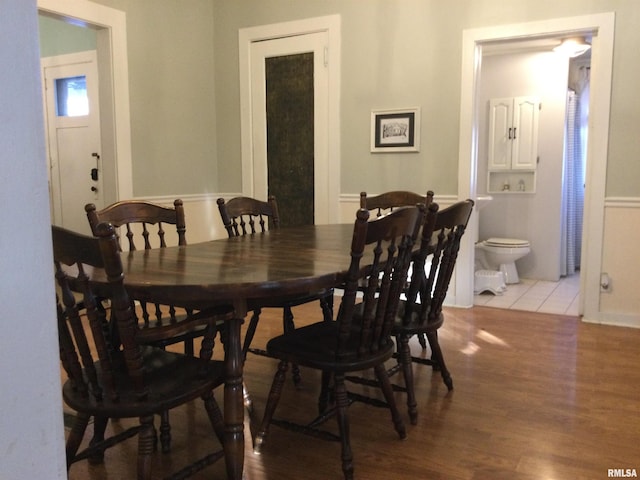 dining space featuring light wood-type flooring