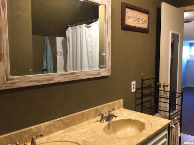 bathroom with vanity and walk in shower