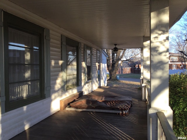 wooden terrace with a porch