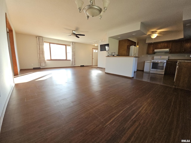 unfurnished living room featuring ceiling fan and dark wood-type flooring