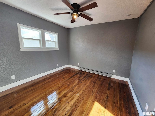 unfurnished room with ceiling fan, a baseboard radiator, a textured ceiling, and wood-type flooring