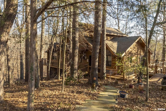 221 Poplar Lake Rd, Makanda, IL 62958 - view of front of property featuring log siding, a shingled roof, and a deck