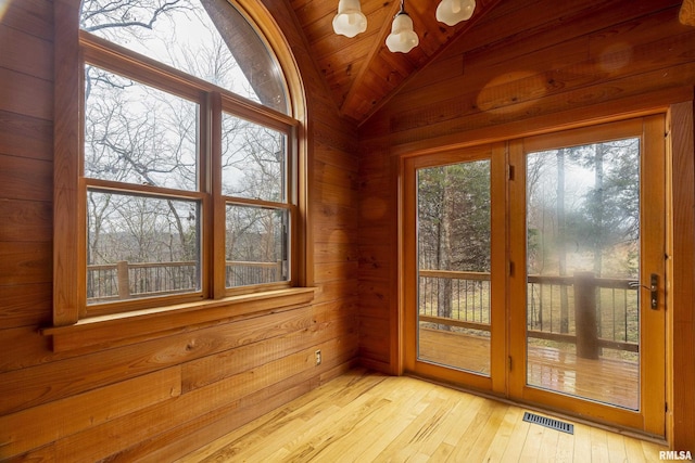 221 Poplar Lake Rd, Makanda, IL 62958 - entryway featuring lofted ceiling, wooden ceiling, light wood-style flooring, and wood walls