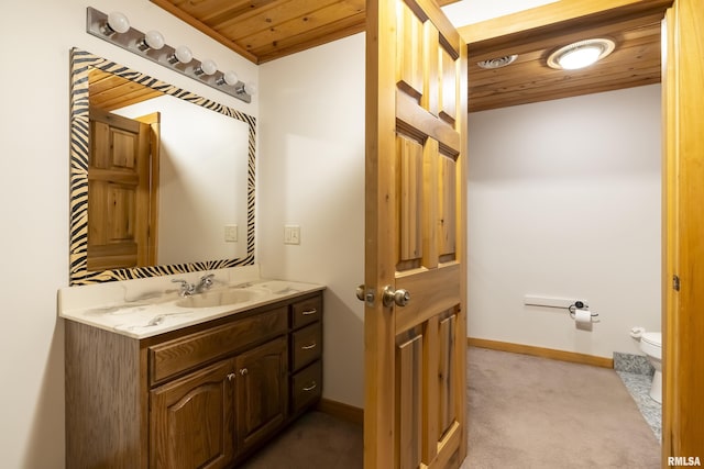 221 Poplar Lake Rd, Makanda, IL 62958 - bathroom with wooden ceiling, toilet, vanity, and baseboards