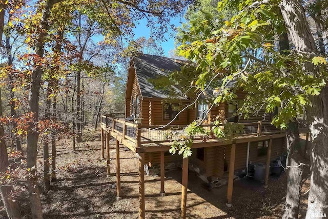 221 Poplar Lake Rd, Makanda, IL 62958 - rear view of property with a deck, roof with shingles, and log exterior