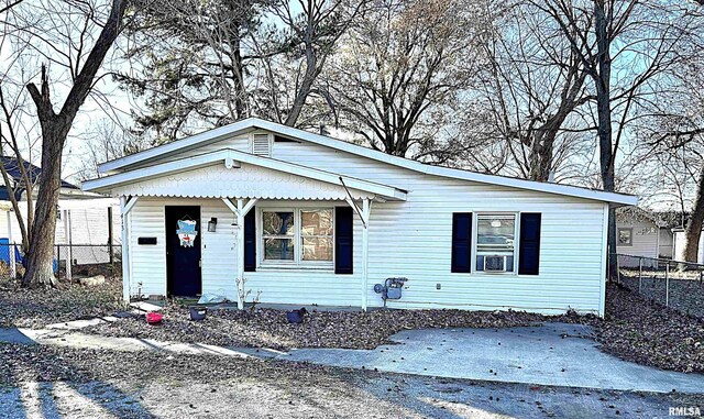 view of front of property with cooling unit