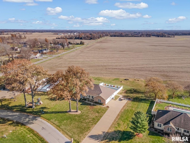 birds eye view of property with a rural view