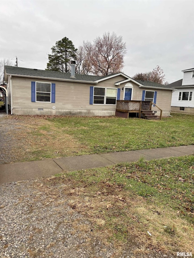 manufactured / mobile home with a front yard