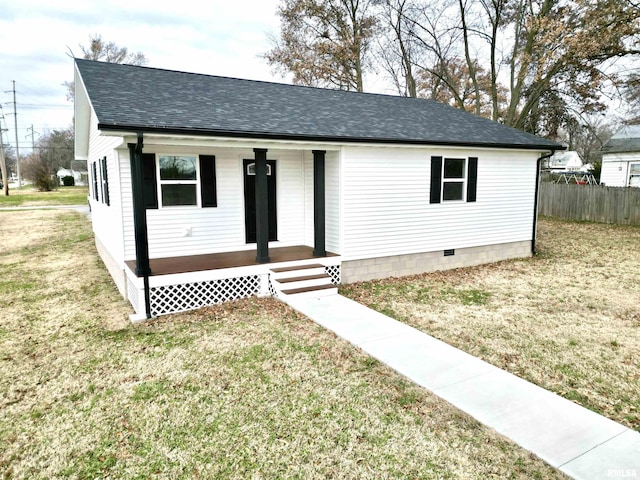 view of front of home with a front lawn