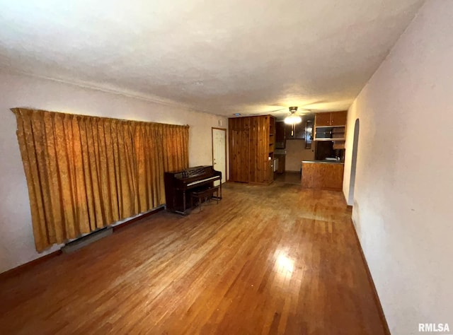 unfurnished living room featuring hardwood / wood-style floors