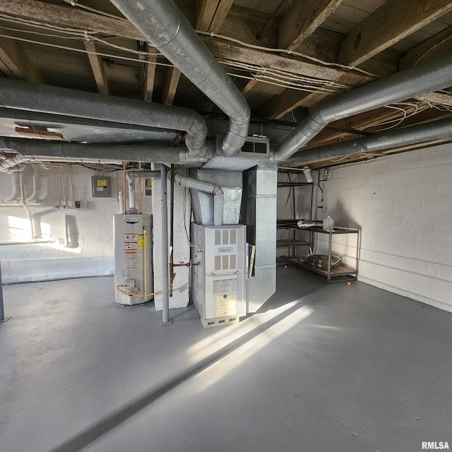 basement featuring heating unit, water heater, and electric panel