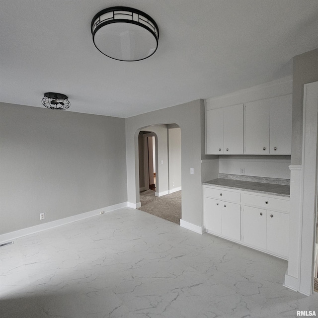 kitchen with white cabinets