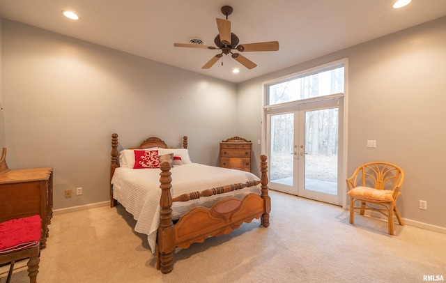 carpeted bedroom featuring french doors, access to outside, and ceiling fan