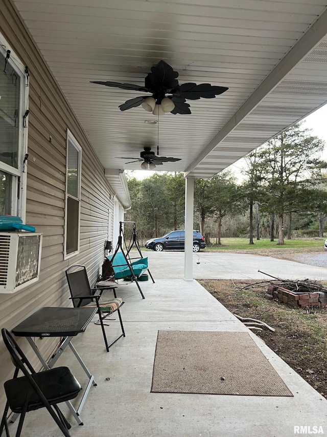 view of patio / terrace featuring ceiling fan