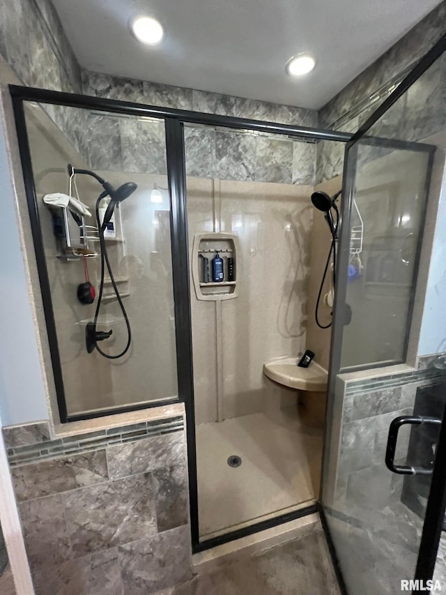 bathroom with an enclosed shower