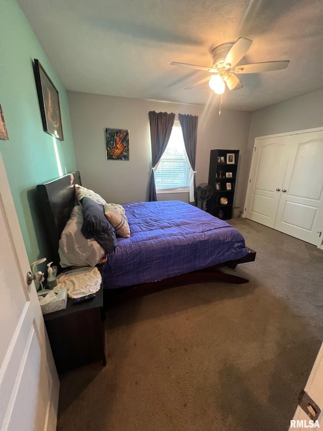 carpeted bedroom featuring ceiling fan