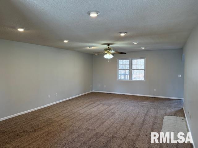 14892 Fowler School Rd, Marion, IL 62959 - unfurnished room with carpet flooring, a ceiling fan, a textured ceiling, and recessed lighting