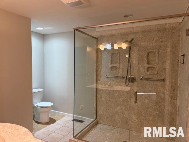 14892 Fowler School Rd, Marion, IL 62959 - full bath featuring tile patterned flooring and a shower stall