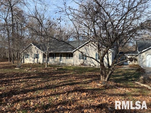 14892 Fowler School Rd, Marion, IL 62959 - view of property exterior with a garage