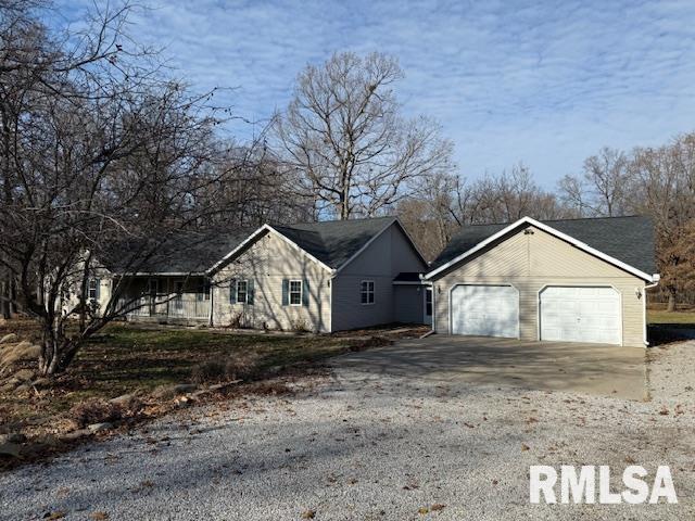 14892 Fowler School Rd, Marion, IL 62959 - view of front of home featuring a garage and driveway