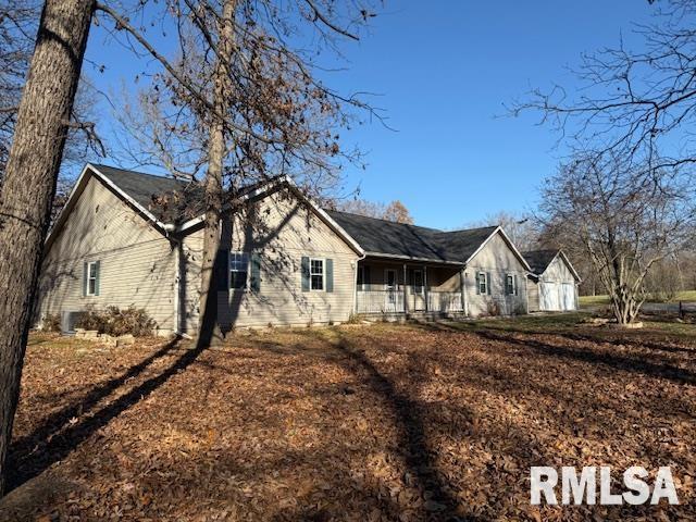 14892 Fowler School Rd, Marion, IL 62959 - view of home's exterior with covered porch